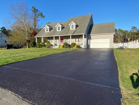 How Sealcoating Helps Protect Your Lacey Township Driveway from Cracks, Water, and Weather