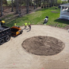Custom-Circular-Asphalt-Driveway-with-Concrete-Pad-Wall-Township 0